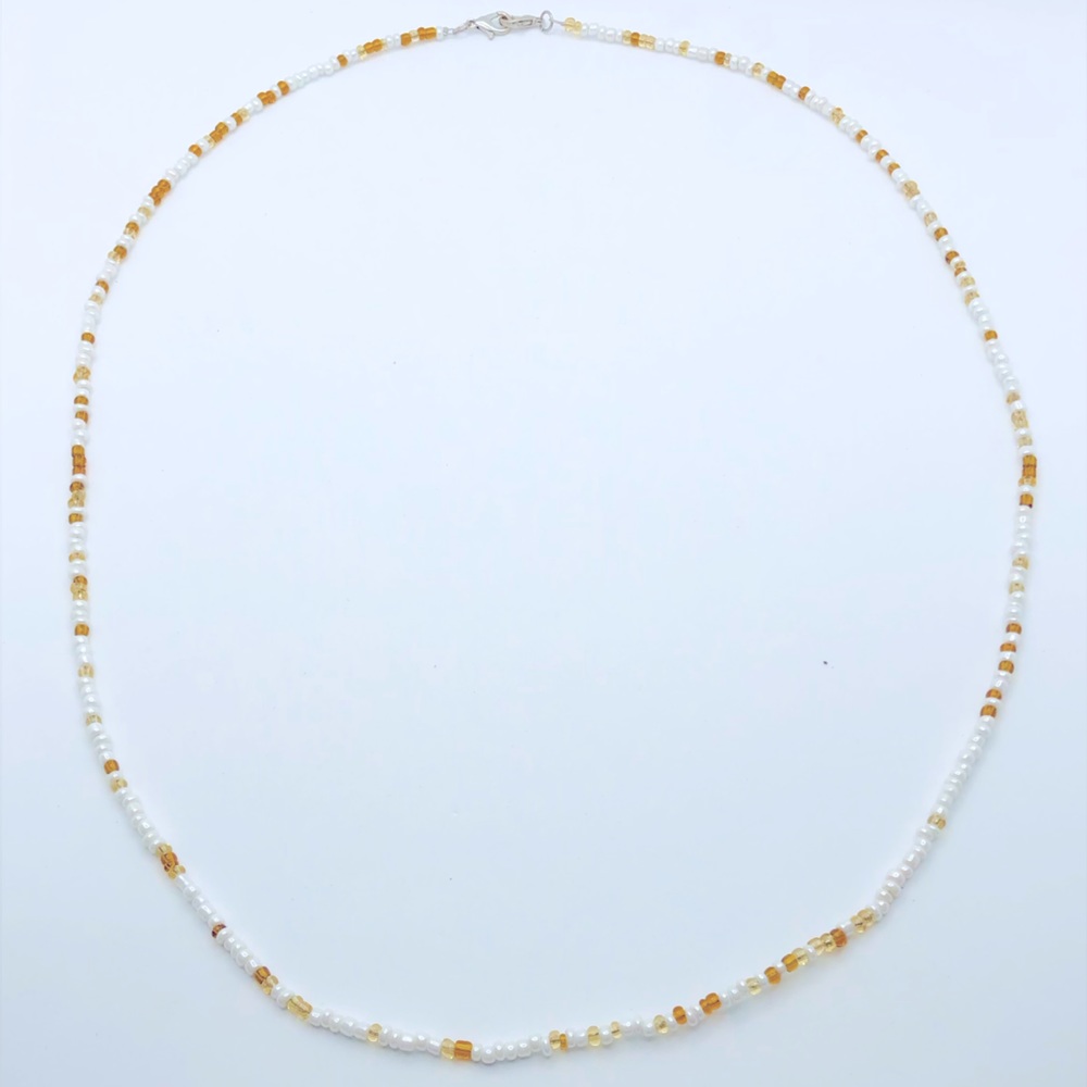 Unknown brand necklace yellow and white